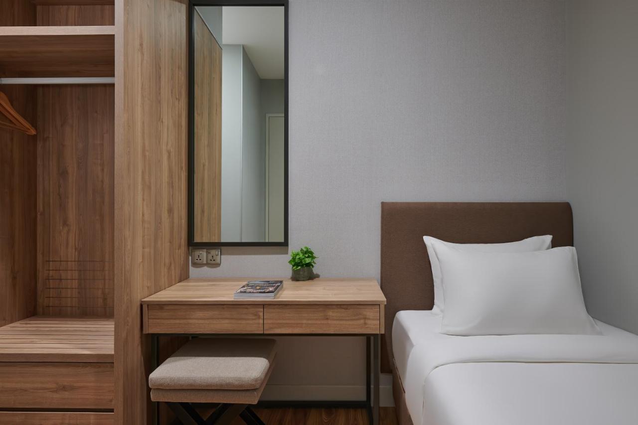Mercure Living פוטראג'איה מראה חיצוני תמונה A bedroom at the hotel