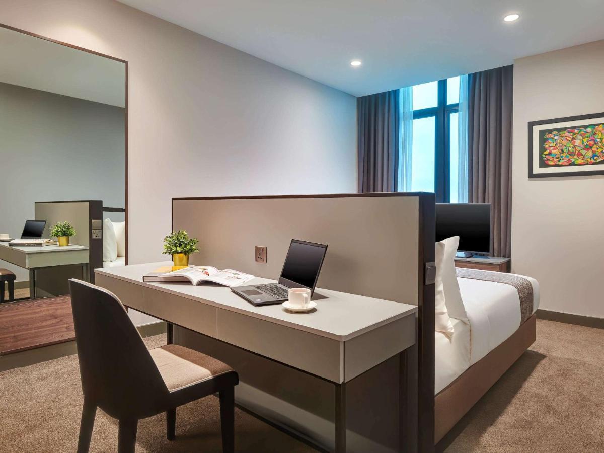 Mercure Living פוטראג'איה מראה חיצוני תמונה A bedroom at the hotel